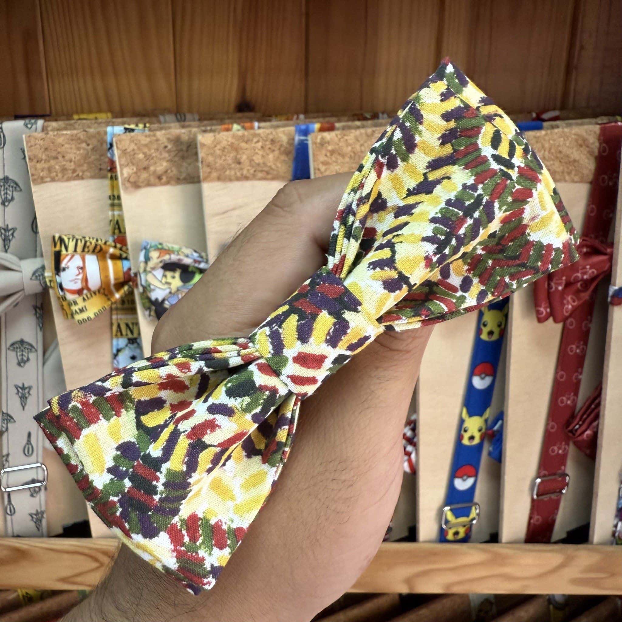 1. Lazo de tela con estampado multicolor para accesorios y moda infantil.