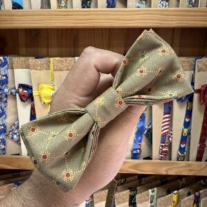 1. Lazo de tela dorada con estampado de sol y puntos en colores vibrantes para accesorios y moda.