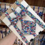Arnés de tela con estampado de super Mario para mascotas, resistente y cómodo.