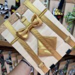 1. Lazo para cabello dorado con nudo elegante y accesorios de moda.