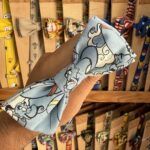1. Lazo de tela con diseño de Disney, como La Bella y La Bestia, para cintas y accesorios divertidos.