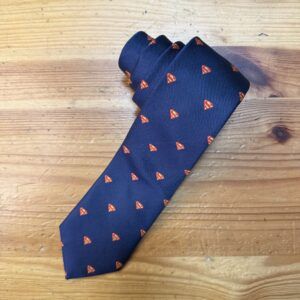 Corbata azul con estampado de Superman, elegante y moderna.