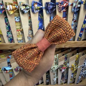 1. Bucle de lazo de tela trenzada en tonos naranja y marrón para accesorios de moda.