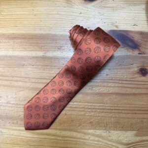 Corbata de diseño con patrón circular para hombre, sofisticada y moderna.
