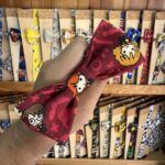 Lazo de tela de Harry Potter con personajes y varitas mágicas, ideal para accesorios y moda infantil.