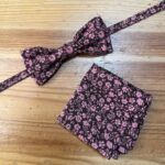 Lazo de tela con estampado floral rosa y negro para accesorios y manualidades.