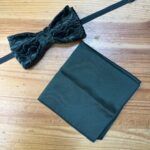 Alto filtro de lazo negro con flor de terciopelo para accesorios de moda elegante.