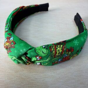 Diadema de tela con estampado colorido y diseño infantil para accesorios de moda.
