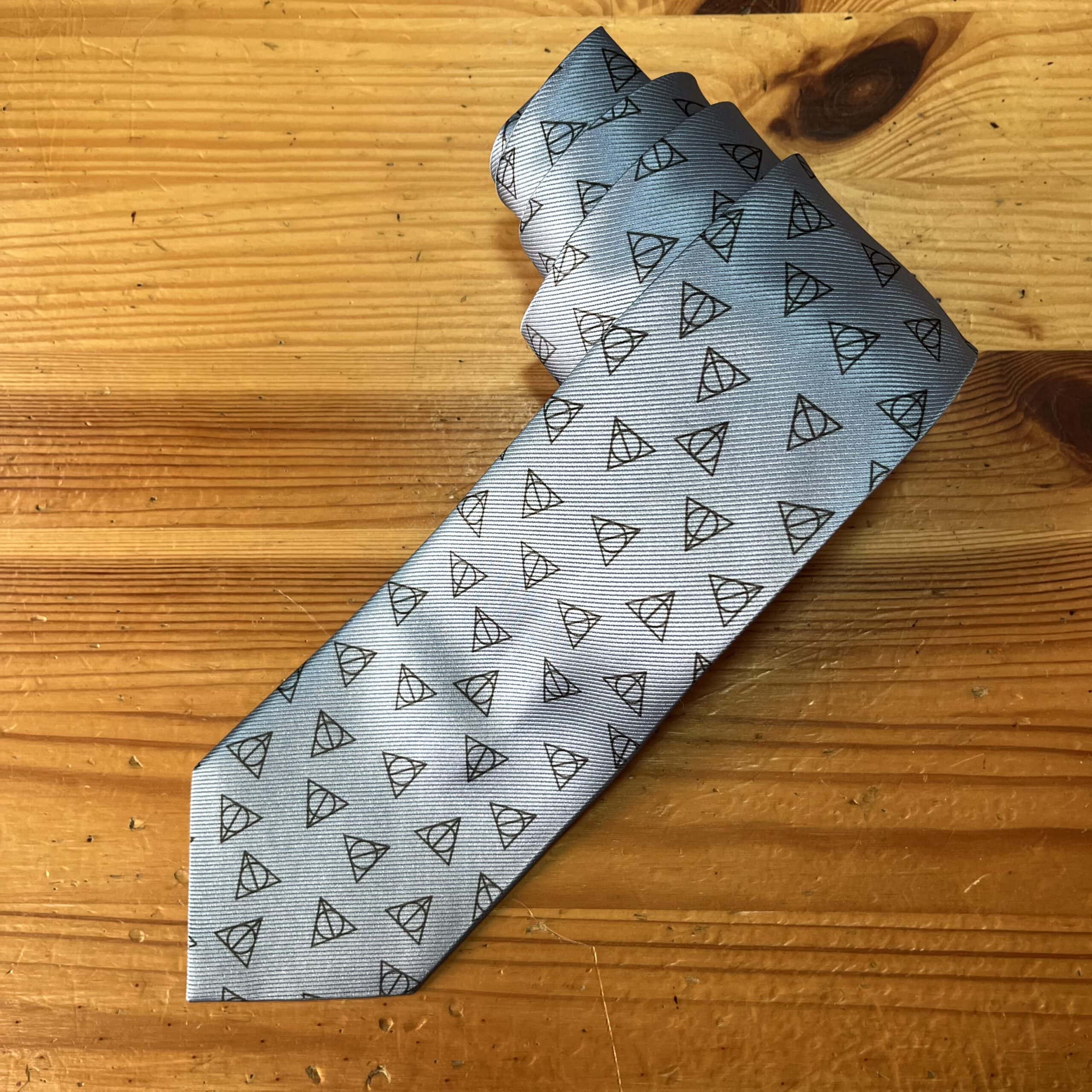 H.P. Triangulo Gris Oscuro